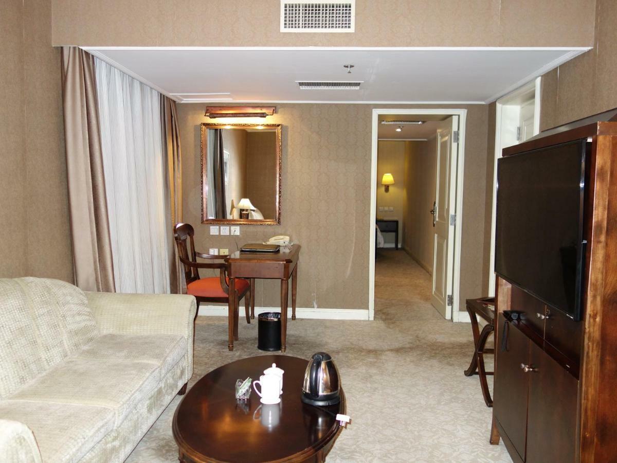 Harbin International Hotel Quarto foto