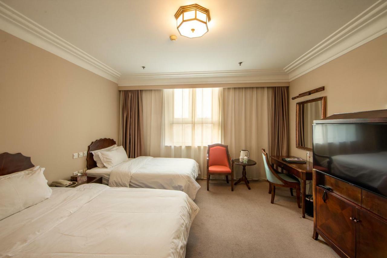 Harbin International Hotel Quarto foto